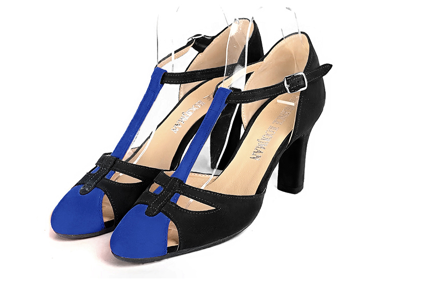 French elegance and refinement for these electric blue and matt black dress T-strap open side shoes, 
                available in many subtle leather and colour combinations. A pretty model with a comfortable "Salomé" strap and good support.
Its charming spyglass cut-out gives you plenty of scope for personalisation.  
                Matching clutches for parties, ceremonies and weddings.   
                You can customize these shoes to perfectly match your tastes or needs, and have a unique model.  
                Choice of leathers, colours, knots and heels. 
                Wide range of materials and shades carefully chosen.  
                Rich collection of flat, low, mid and high heels.  
                Small and large shoe sizes